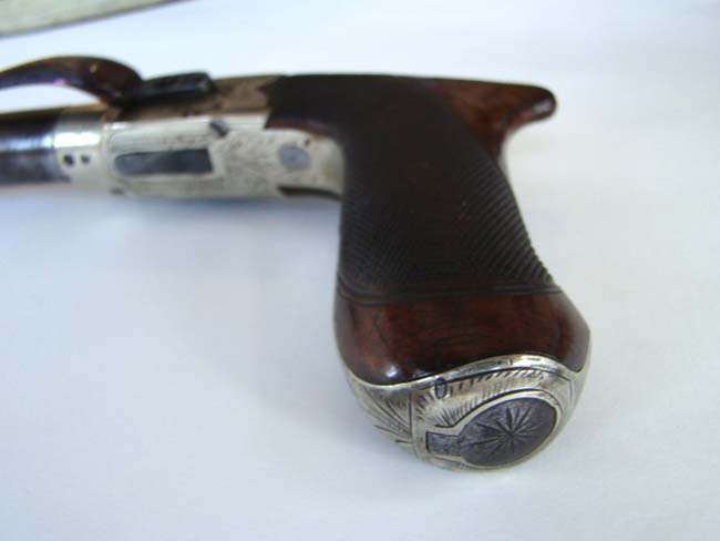 An English percussion 'boot' pistol by William Westley Richards, Gunmaker to Prince Albert, circa 1840-1850. — image 2
